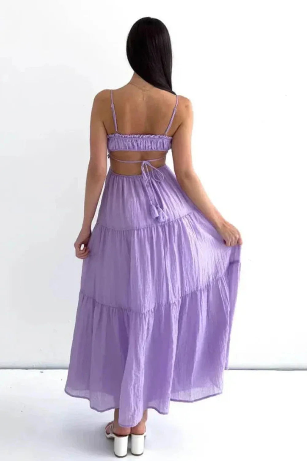 Back view of the Amelia lavender maxi dress showing the open back and tie detail.