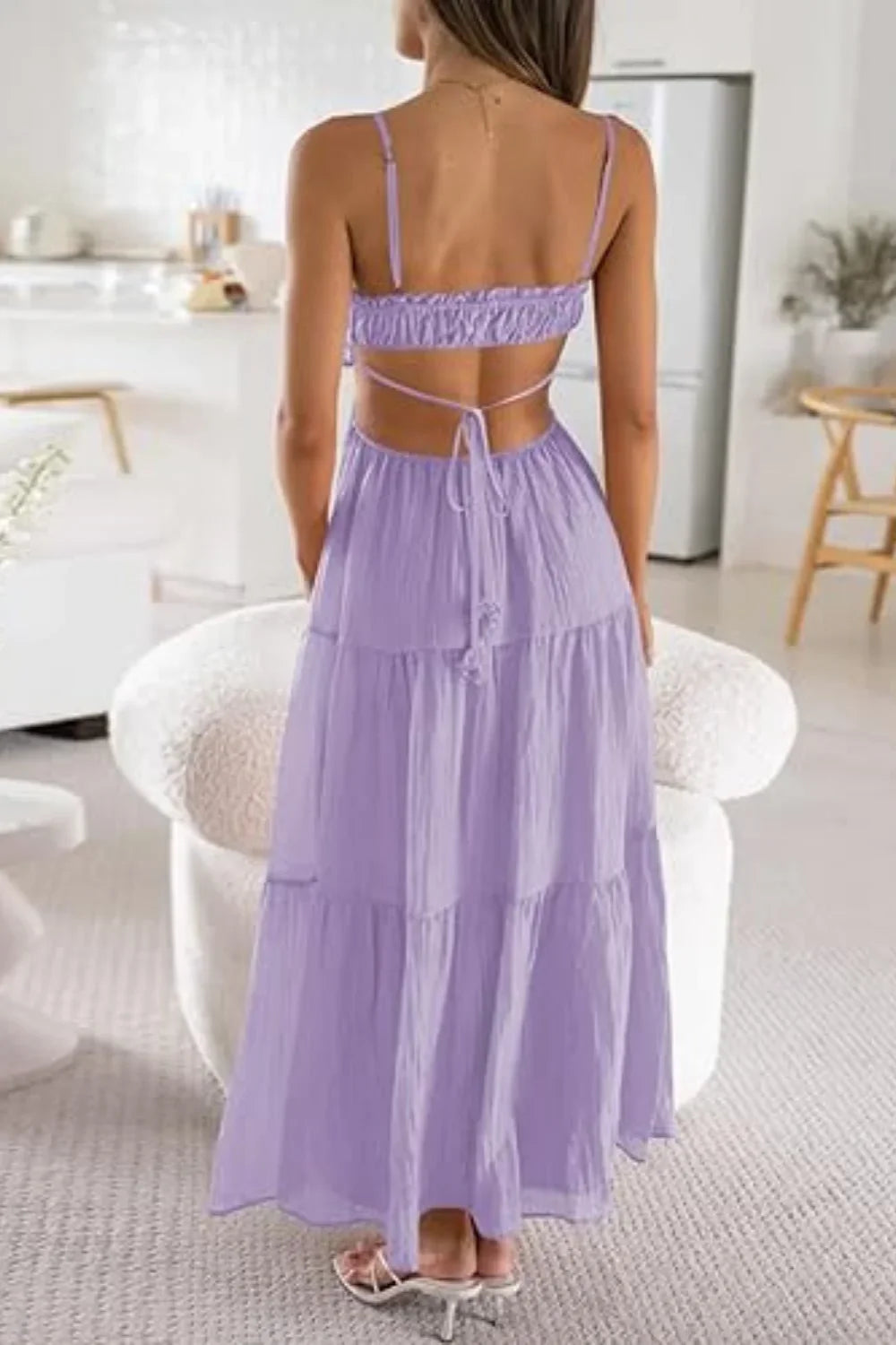 Back view of the Amelia lavender maxi dress showing the open back and tie detail.