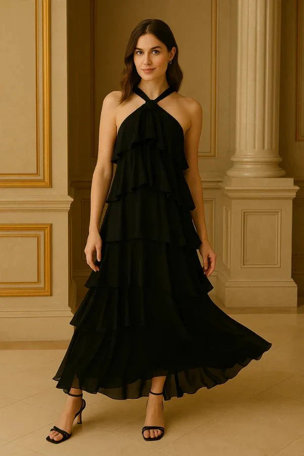 flowy," "cascading," "elegant silhouette," "floor-length," "sophisticated," and "minimalist formalwear
