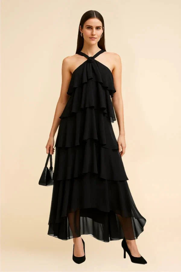 flowy," "cascading," "elegant silhouette," "floor-length," "sophisticated," and "minimalist formalwear