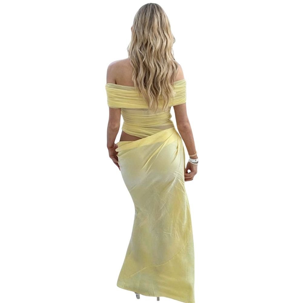 Back view of the Anita pale yellow formal dress by Kouvr.
