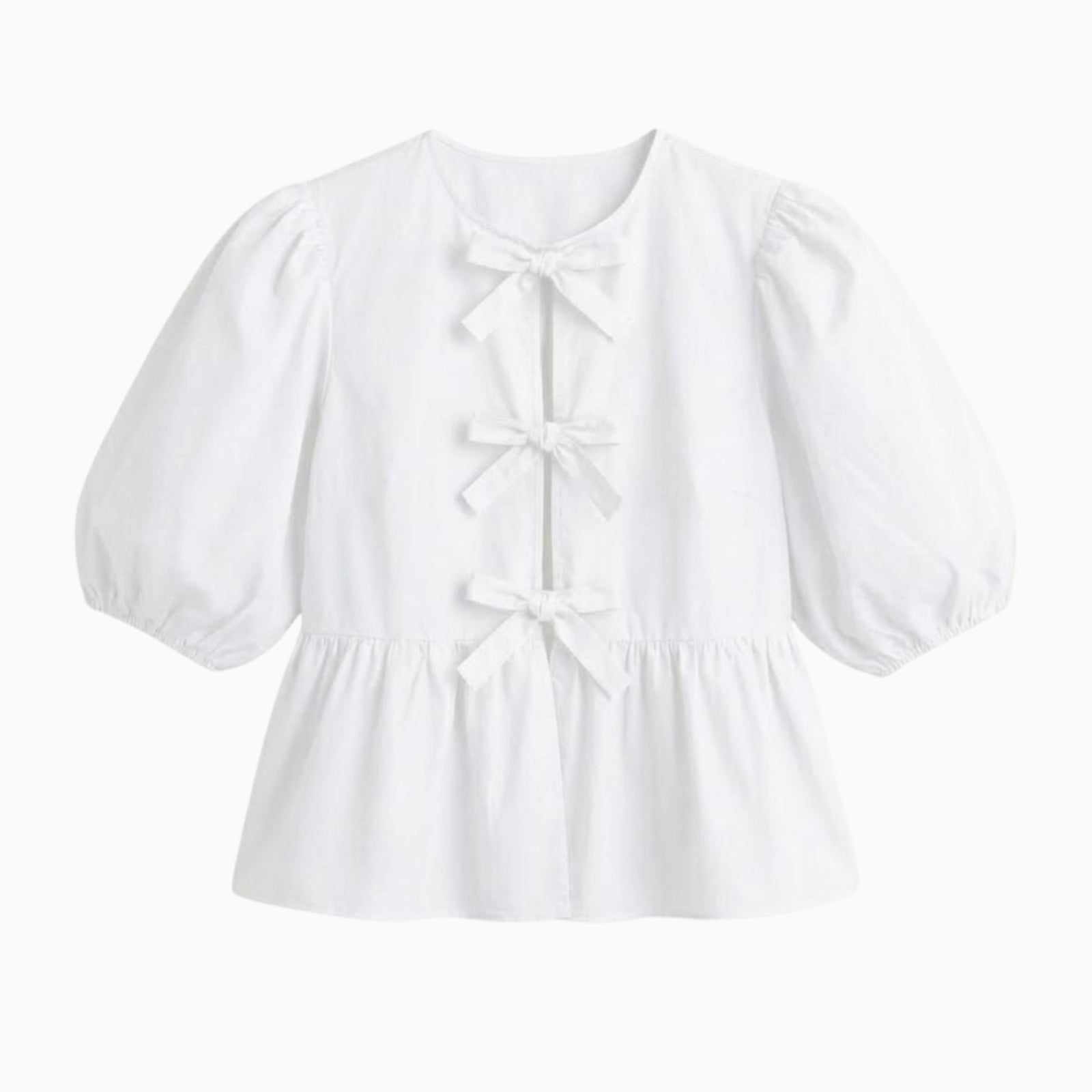 Flat lay image of the white Kouvr Anne peplum blouse showcasing the three front bows and puff sleeve details.