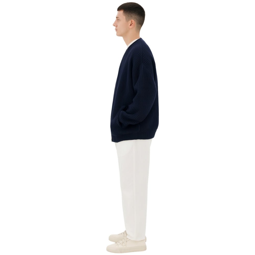 quiet luxury menswear," "minimalist layering piece," "structured knitwear," "transitional outerwear," "designer cardigan