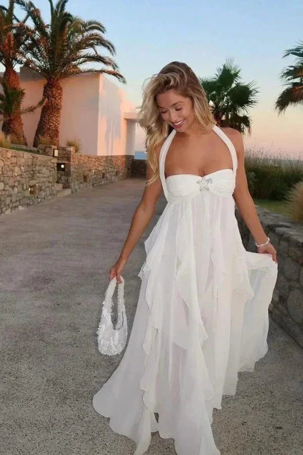 "ethereal," "goddess dress," "flowy," "resort wear," "Santorini style," "beach formal," and "honeymoon outfit