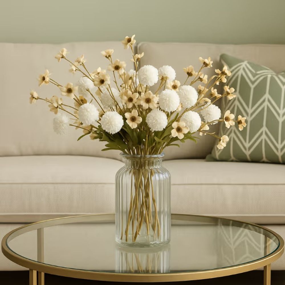 Kouvr Aspen Dream artificial flower arrangement with white pom poms and bleached eucalyptus in a modern matte black ceramic vase