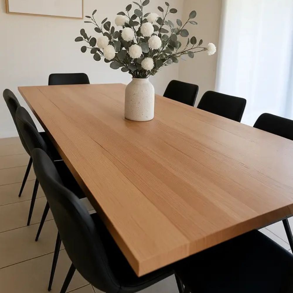 Kouvr Aspen Dream artificial flower arrangement with white pom poms and bleached eucalyptus in a modern matte black ceramic vase