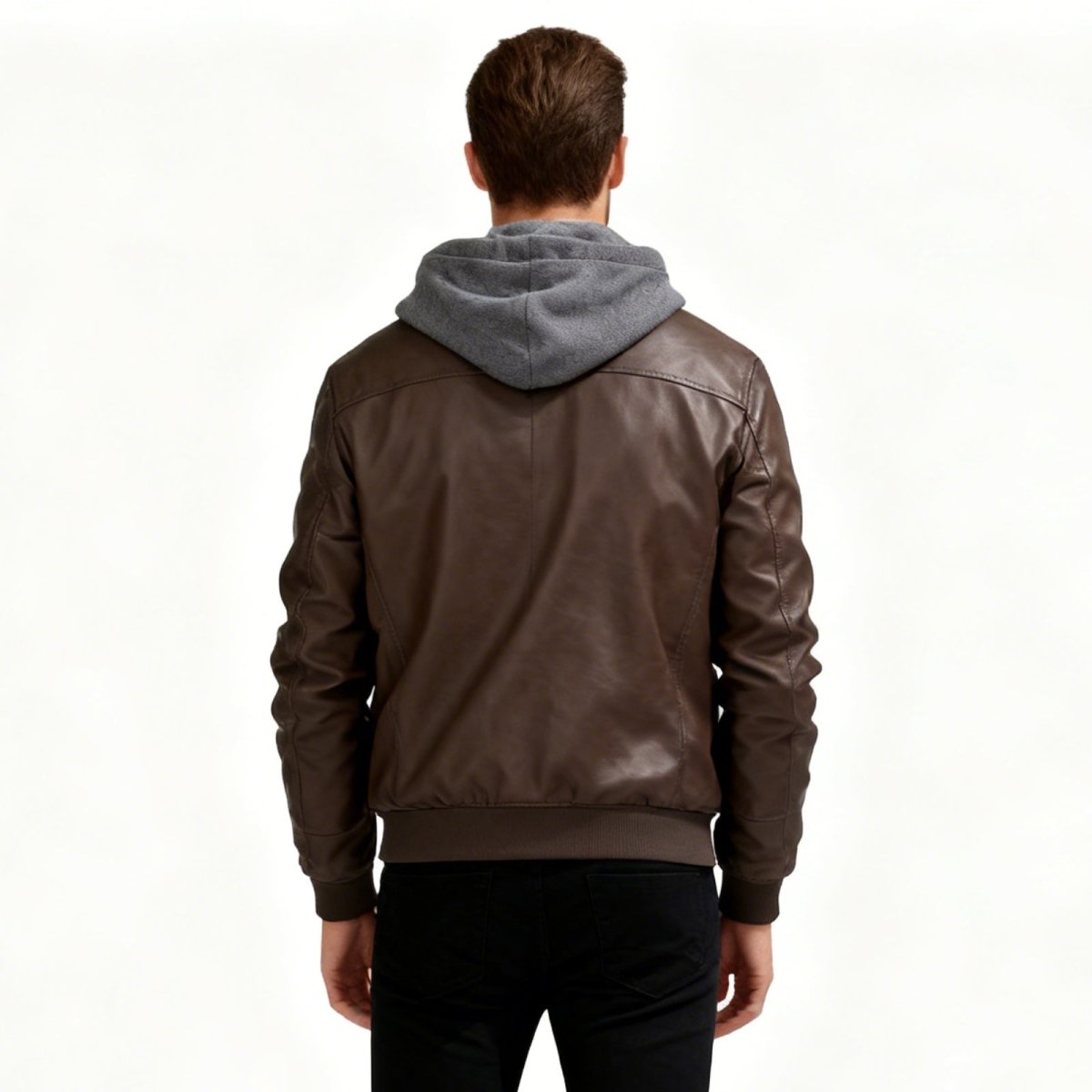 Back view of the Kouvr Ascend men's brown vegan leather jacket, showing the fit across the shoulders and the heather grey jersey hood.