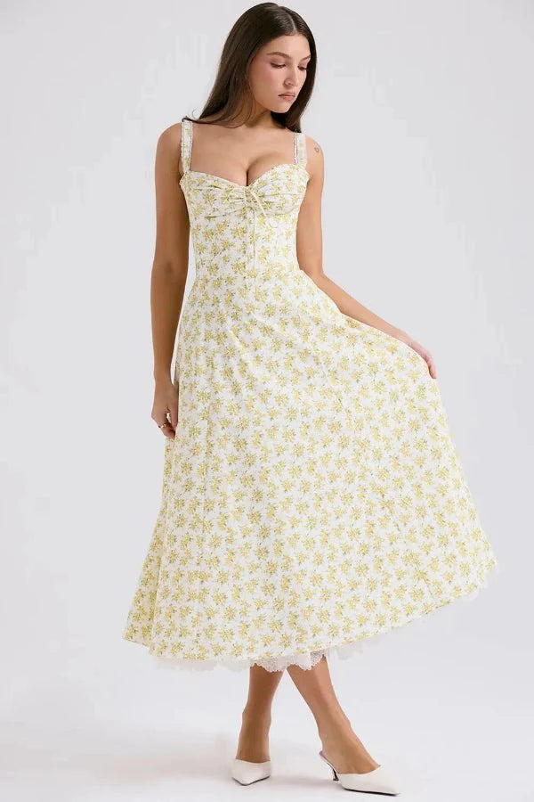 Kouvr's Aviva yellow floral vintage-inspired midi dress with sweetheart neckline and pockets