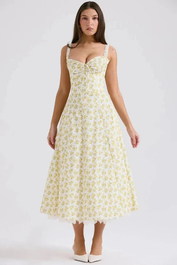 Kouvr's Aviva yellow floral vintage-inspired midi dress with sweetheart neckline and pockets