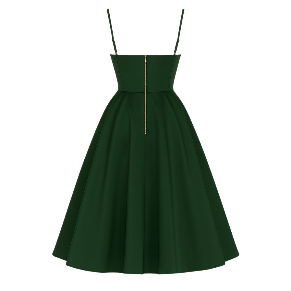Green kouvr dress with thin straps on a white background