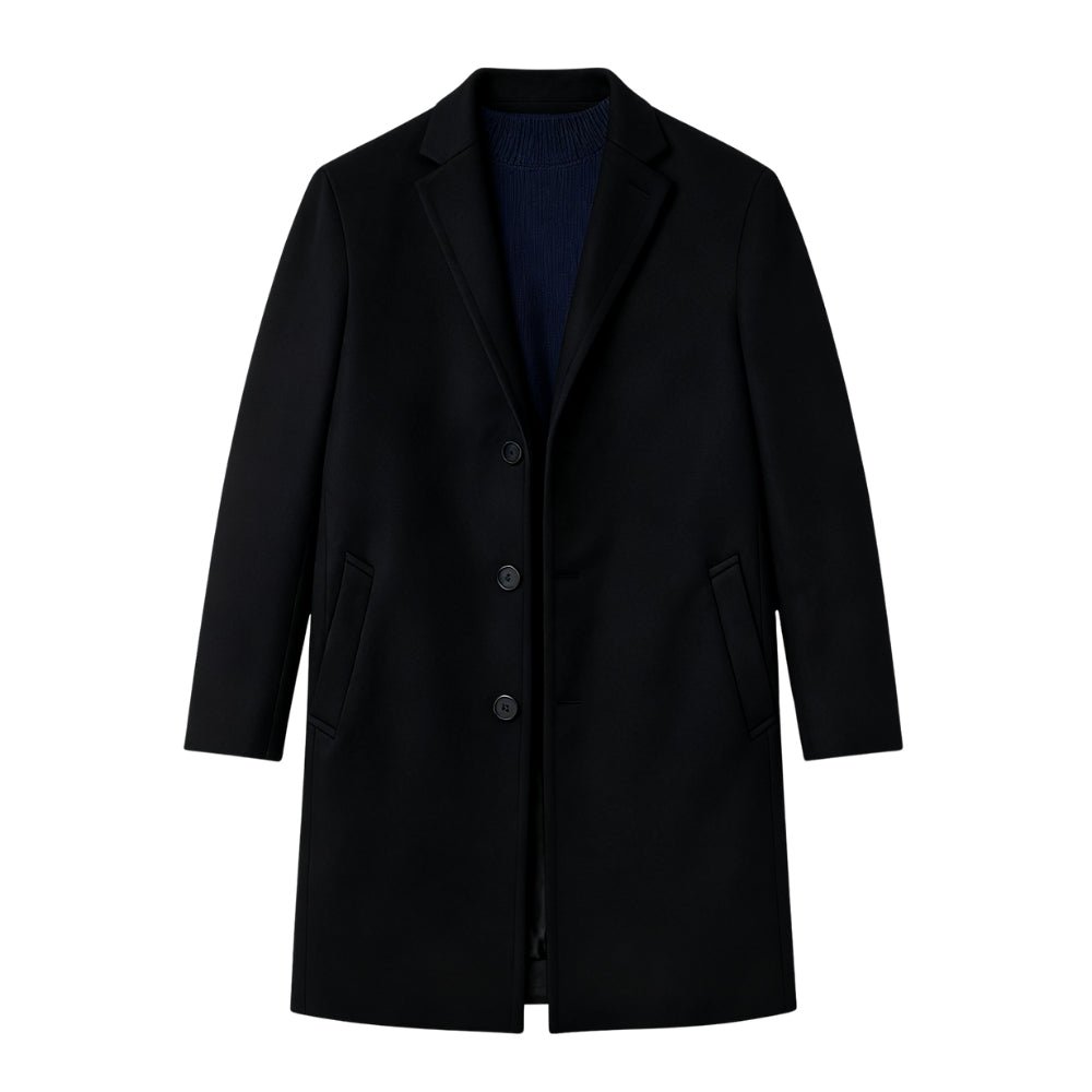 Man wearing a black Kouvr coat on a white background