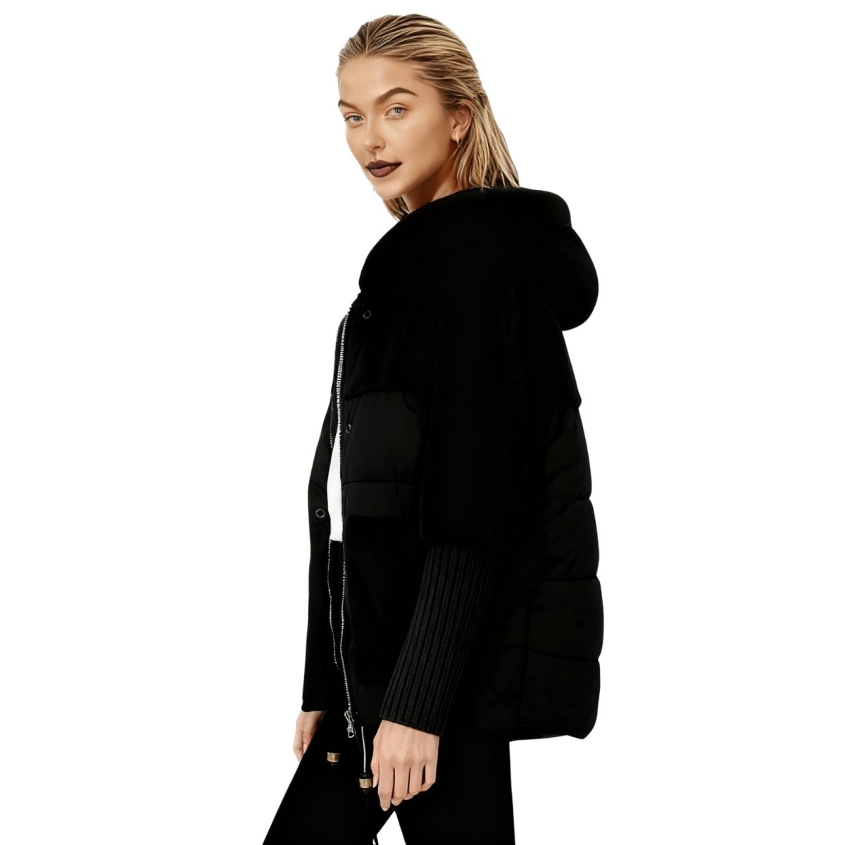 Model wearing the Kouvr black mixed media puffer jacket with faux shearling hood, viewed from the front.