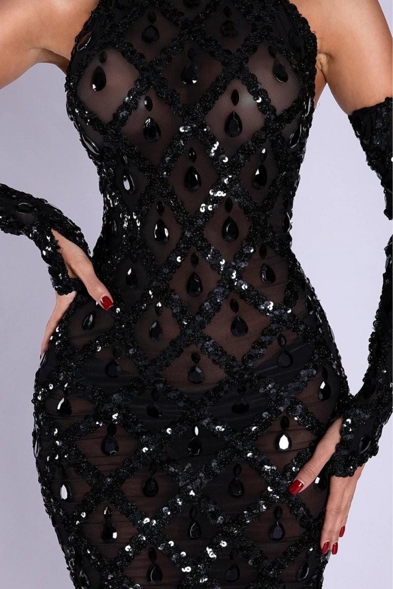 Model wearing Kouvr Fashion black sequin high-neck mini dress with opera gloves from the back
