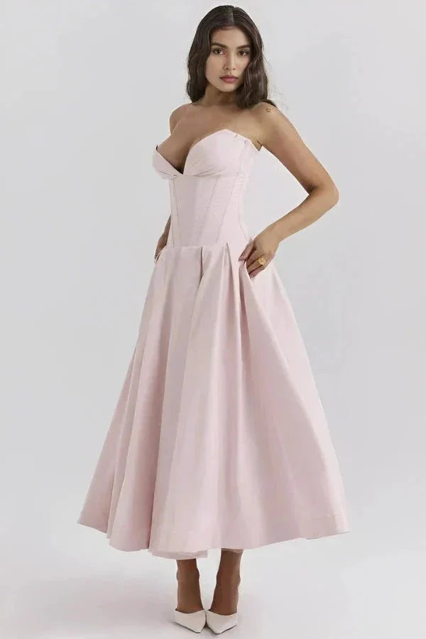 Kouvr Fashion strapless blush pink corset formal midi dress with sweetheart neckline and A-line skirt