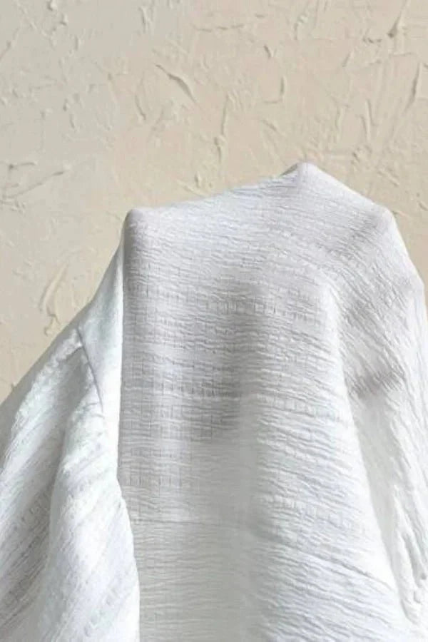 Grecian," "resort wear," "bohemian," "ethereal," "flowy," "bridal