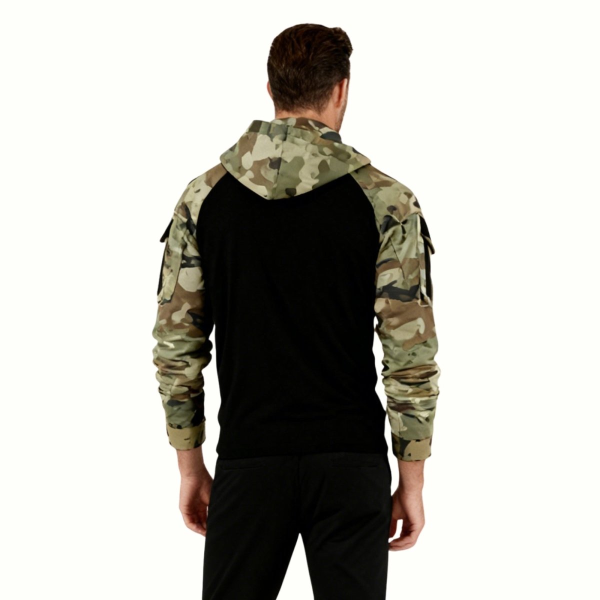 Detail shot of the quarter-zip and high collar on the Kouvr Clint tactical combat shirt in black and multicam camouflage.