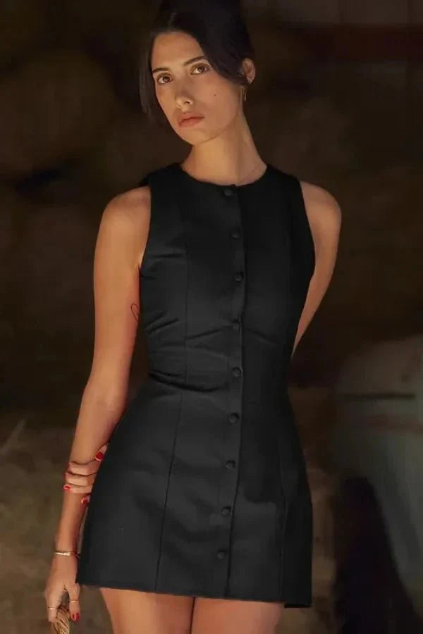 Model wearing the Kouvr Fashion Cosette black sleeveless mini dress