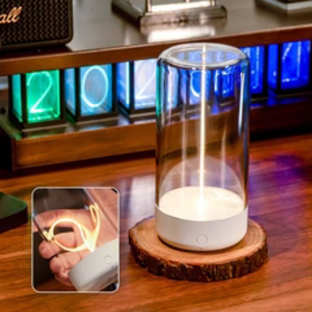 ambient lighting", "warm glow lamp", "minimalist home decor", "touch control light", "USB-C lamp", "portable centerpiece", "breathing light mode", "sculptural lighting", "hygge decor