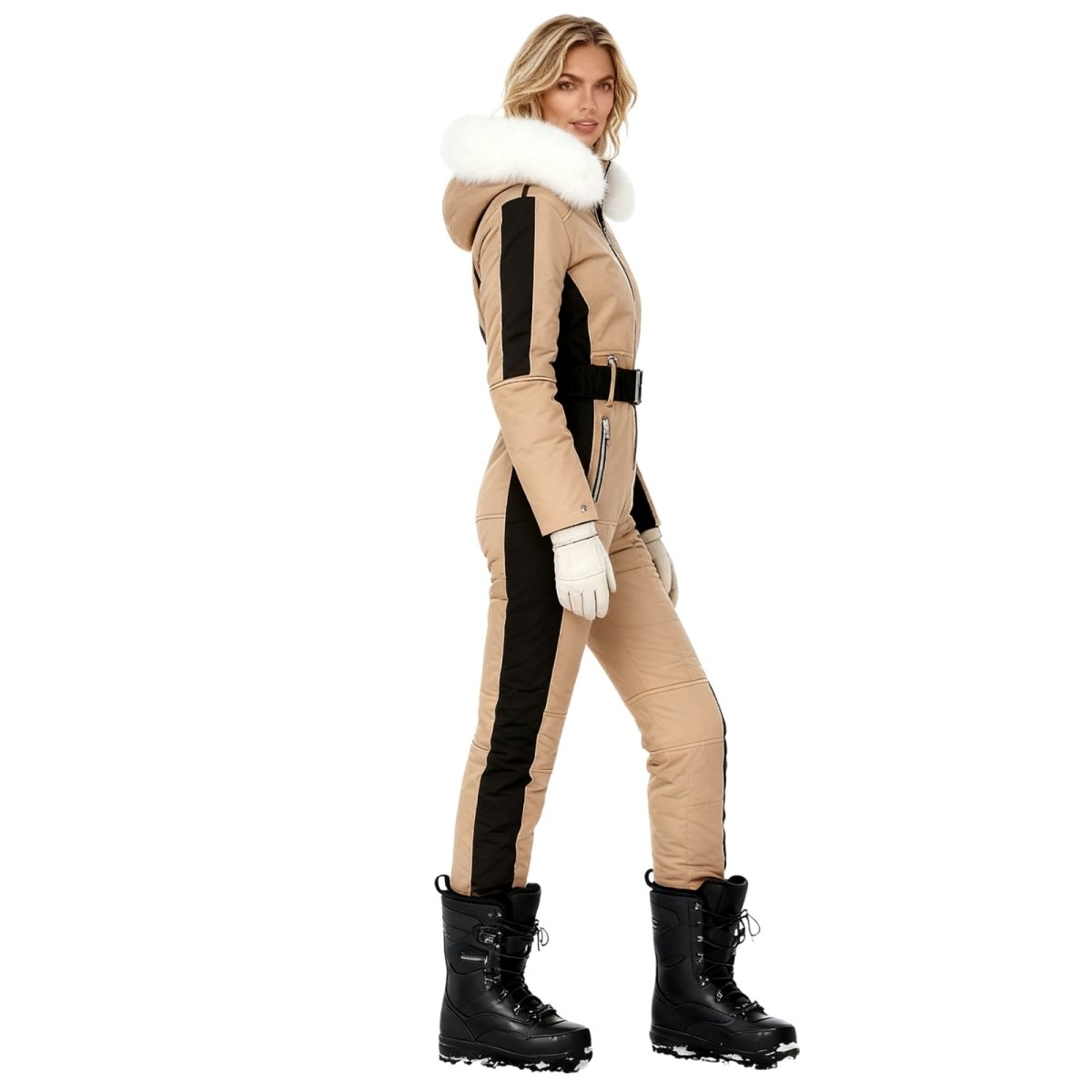 Person wearing a khaki and black kouvr snowsuit with white fur trim on a white background
