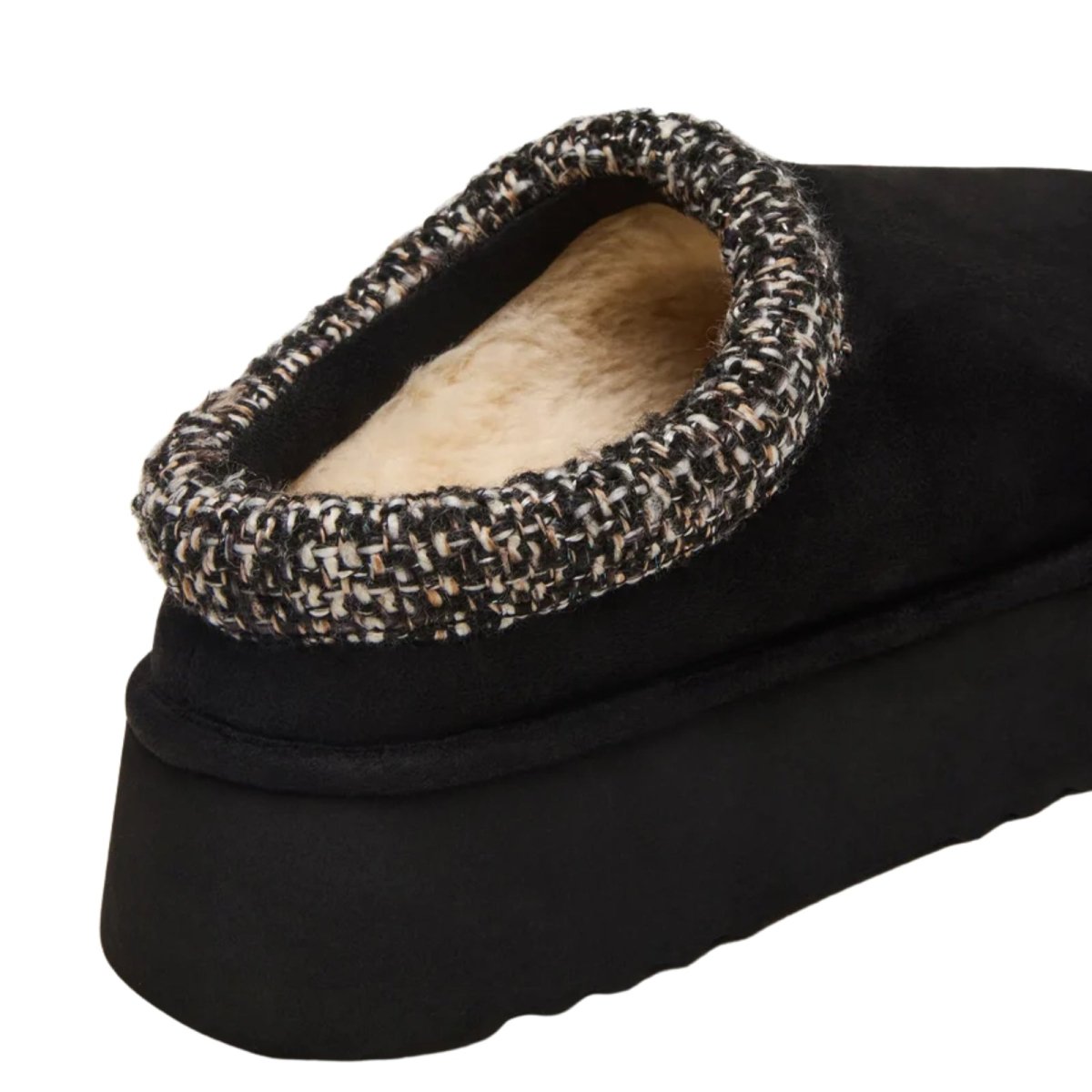 Close-up detail of the woven tweed collar on the Kouvr Elevate Platform Slipper. 