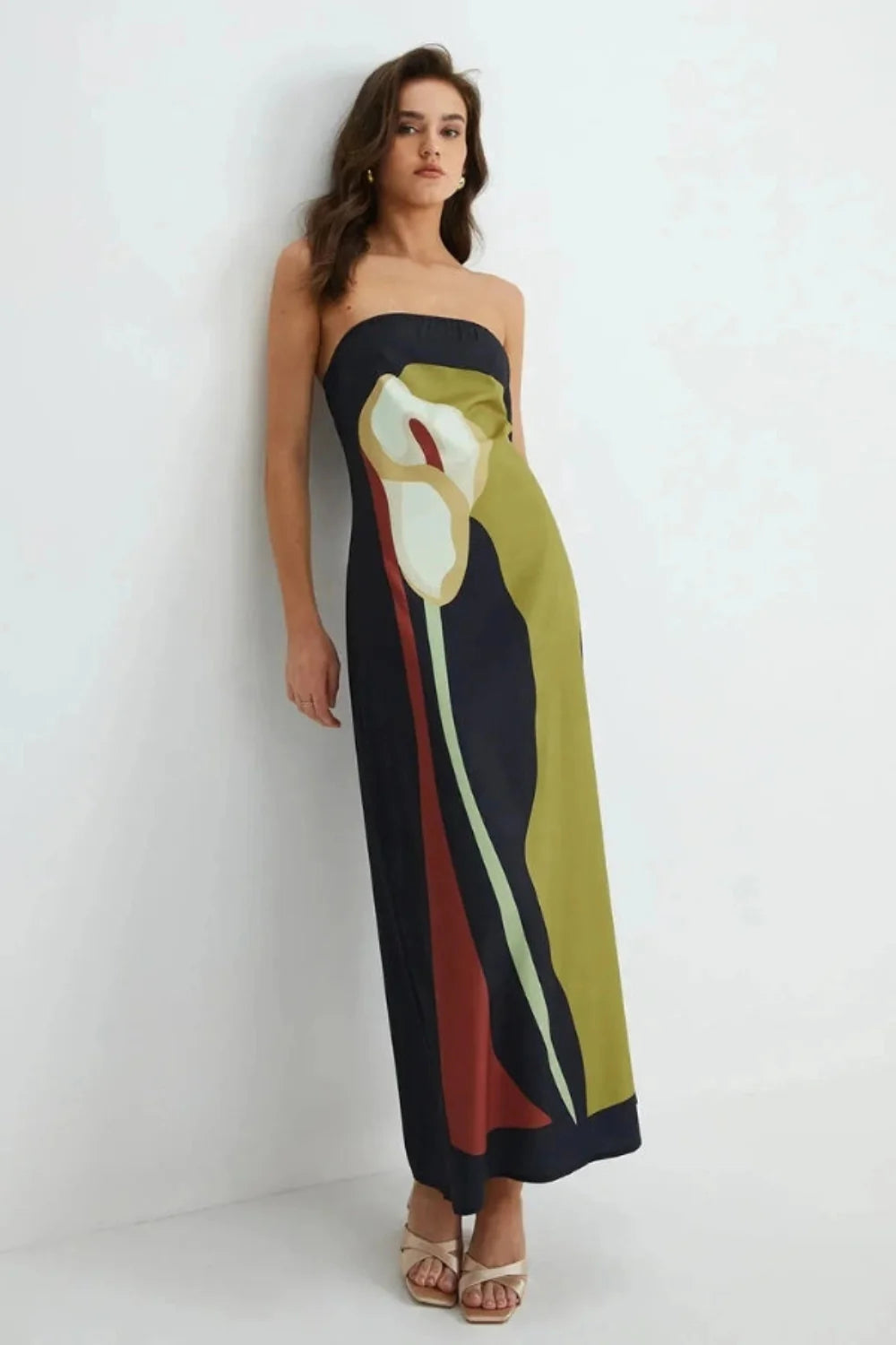 Model wearing the Kouvr Elizabeth abstract floral strapless evening dress