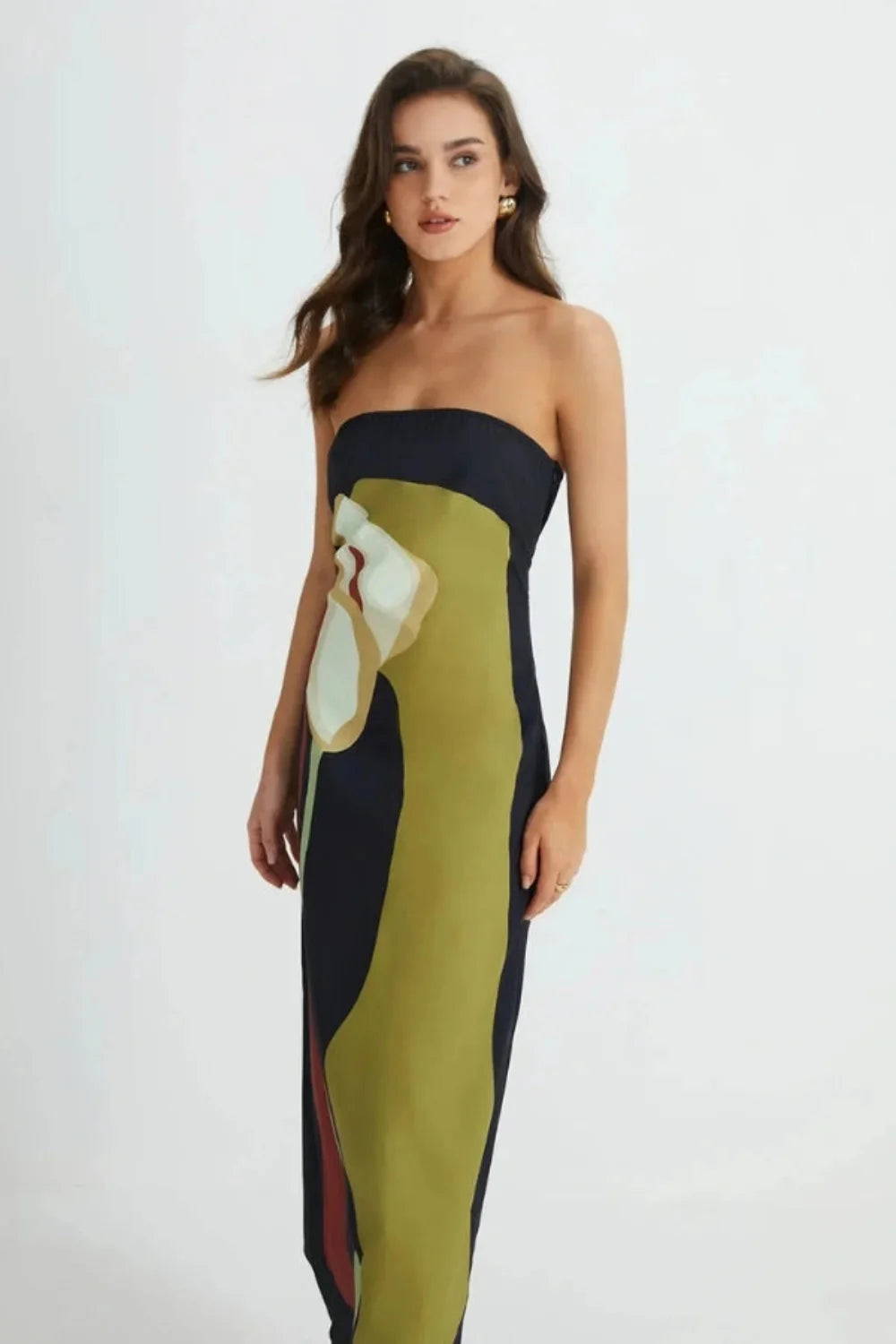 Model wearing the Kouvr Elizabeth abstract floral strapless evening dress