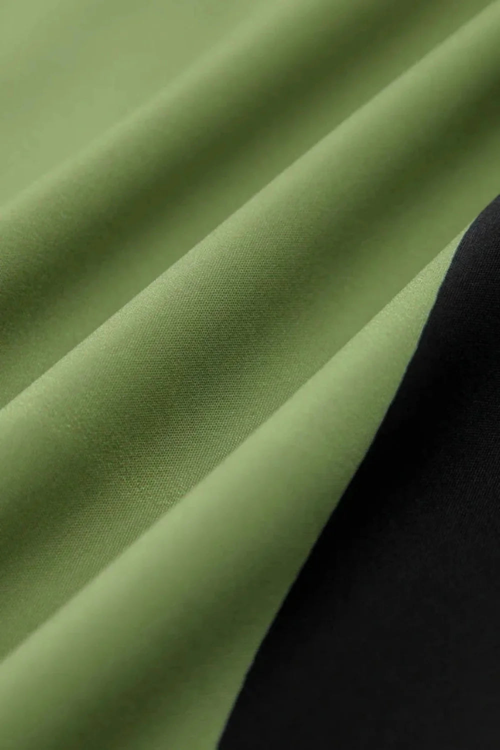 Model wearing the Kouvr Elizabeth abstract floral strapless evening dress