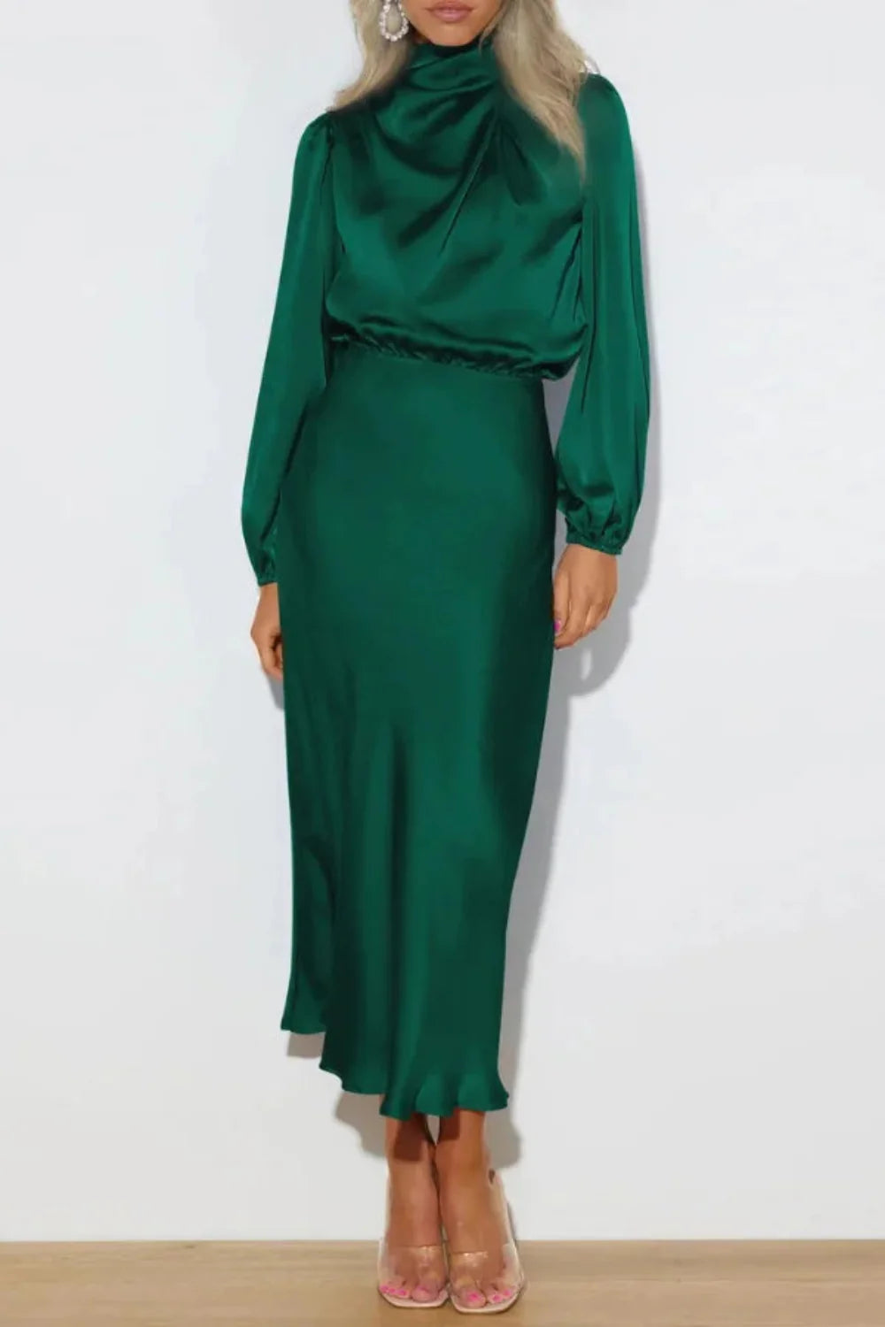 Model from the front wearing the Kouvr Ellana emerald long sleeve satin midi dress