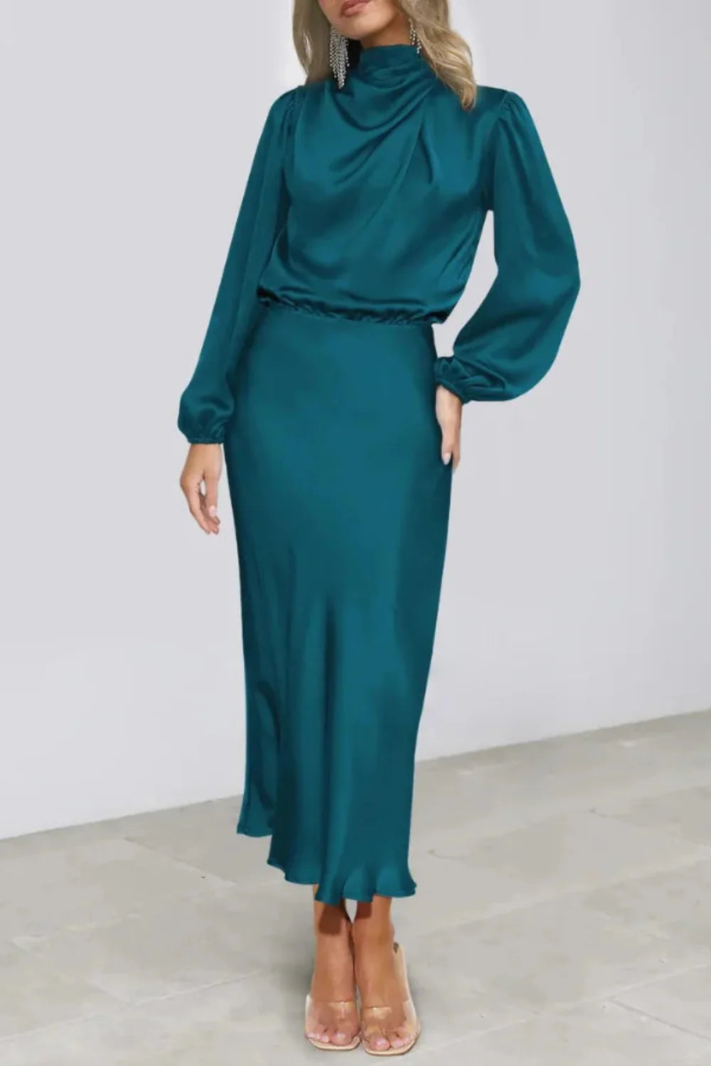 Model wearing the Kouvr Ellana elegant teal satin midi dress with bishop sleeves
