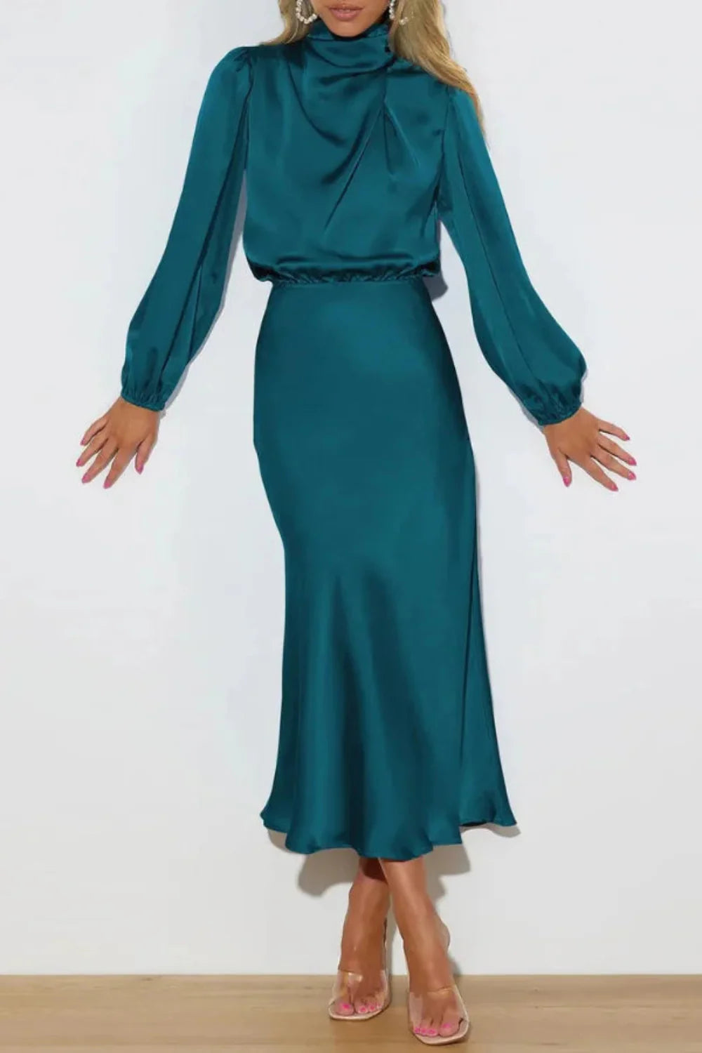 Model wearing the Kouvr Ellana elegant teal satin midi dress with bishop sleeves