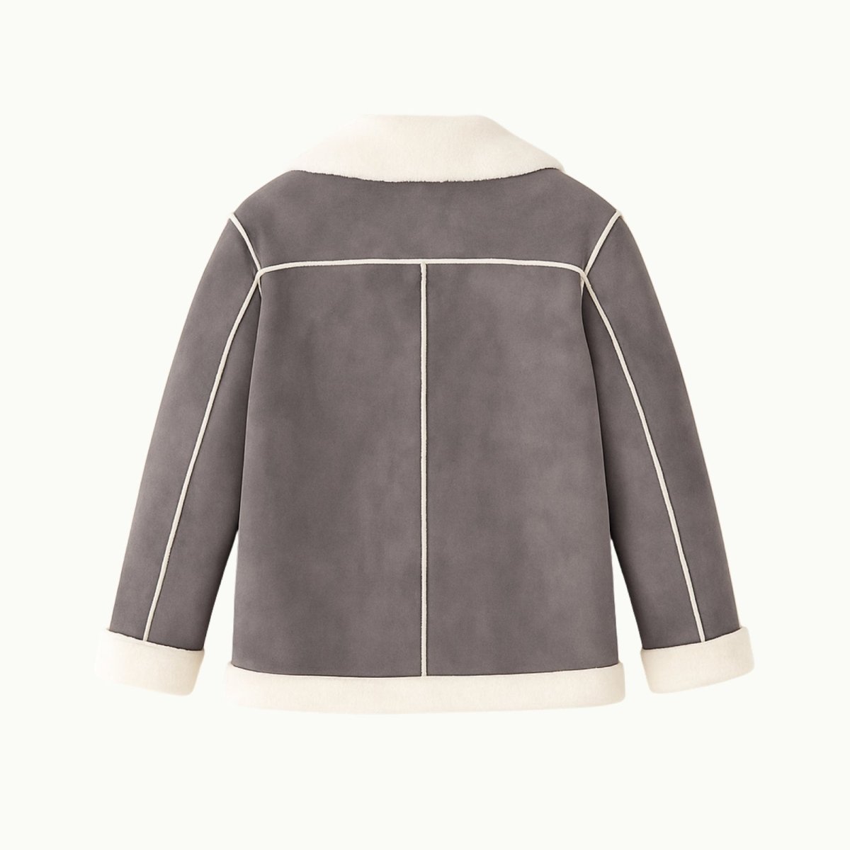 Flatlay product shot of the back of the Kouvr Esmeralda grey shearling jacket, highlighting the center and shoulder seam details.