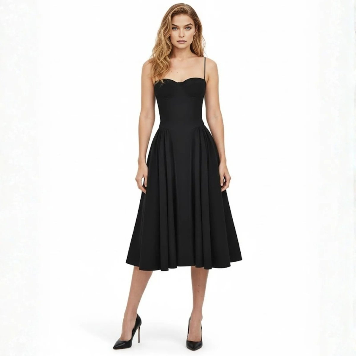 Model wearing the Kouvr Evdokia black midi dress, showcasing its sweetheart neckline, fitted corset bodice, and full A-line skirt.