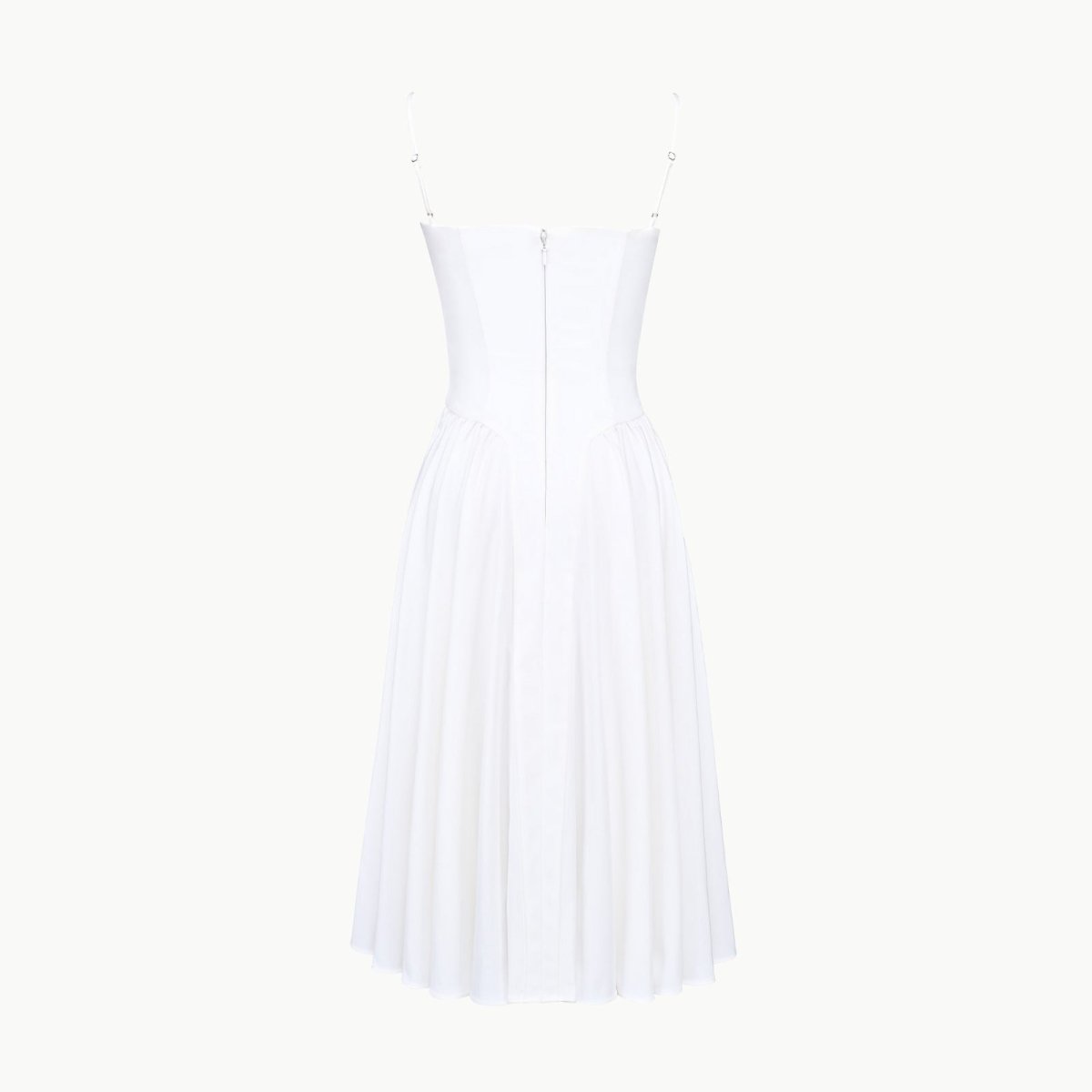 Product-only photo of the back of the Evdokia white corset midi dress, showing the zipper and strap construction.