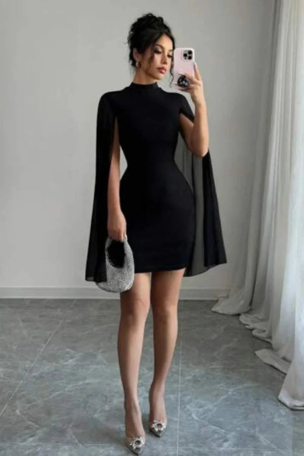 Kouvr Eya black high neck bodycon dress with sheer cape sleeves
