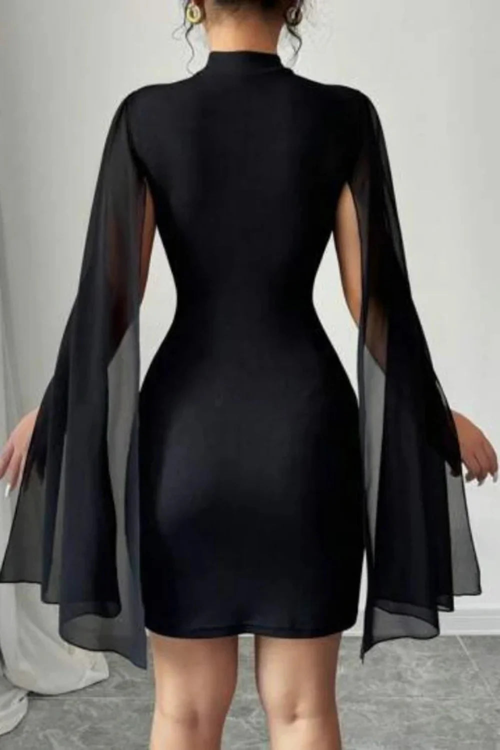 Kouvr Eya black high neck bodycon dress with sheer cape sleeves