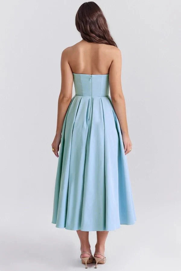 Model wearing the Kouvr Fashion Aneri sky blue strapless A-line midi dress with pleated skirt