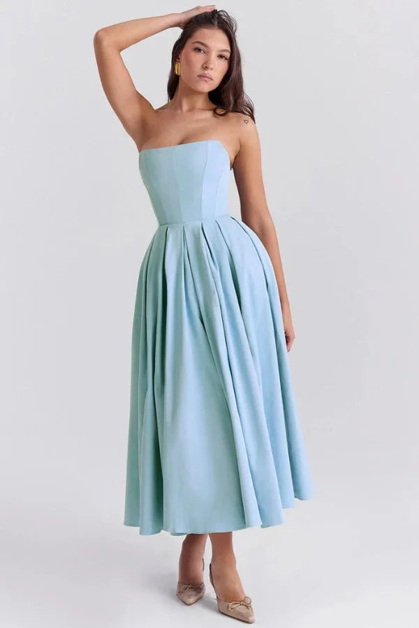Model wearing the Kouvr Fashion Aneri sky blue strapless A-line midi dress with pleated skirt