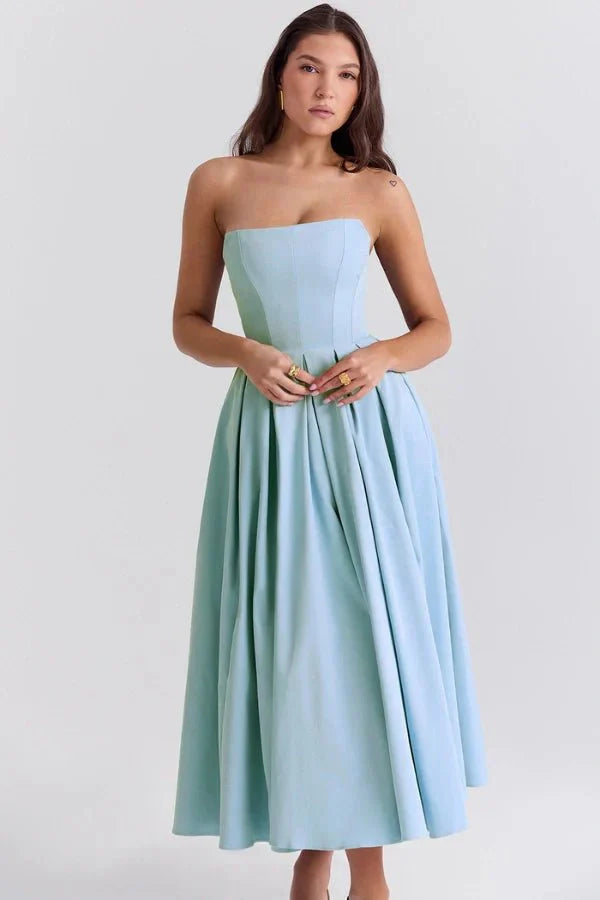 Model wearing the Kouvr Fashion Aneri sky blue strapless A-line midi dress with pleated skirt