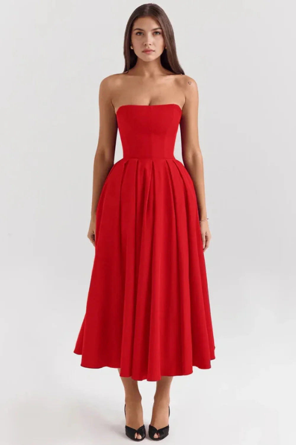 Model wearing the Kouvr Fashion Aneri red strapless formal midi dress