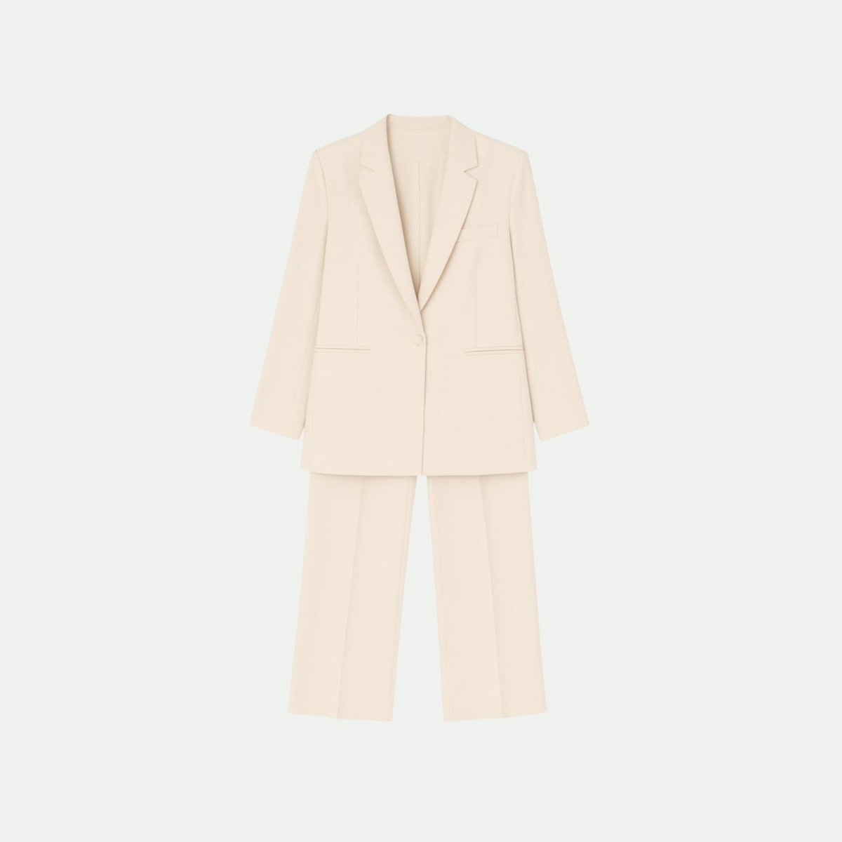 Flat lay of the Kouvr Fashion apricot two-piece suit set, showing the single-breasted blazer and matching straight-leg trousers on a white background.
