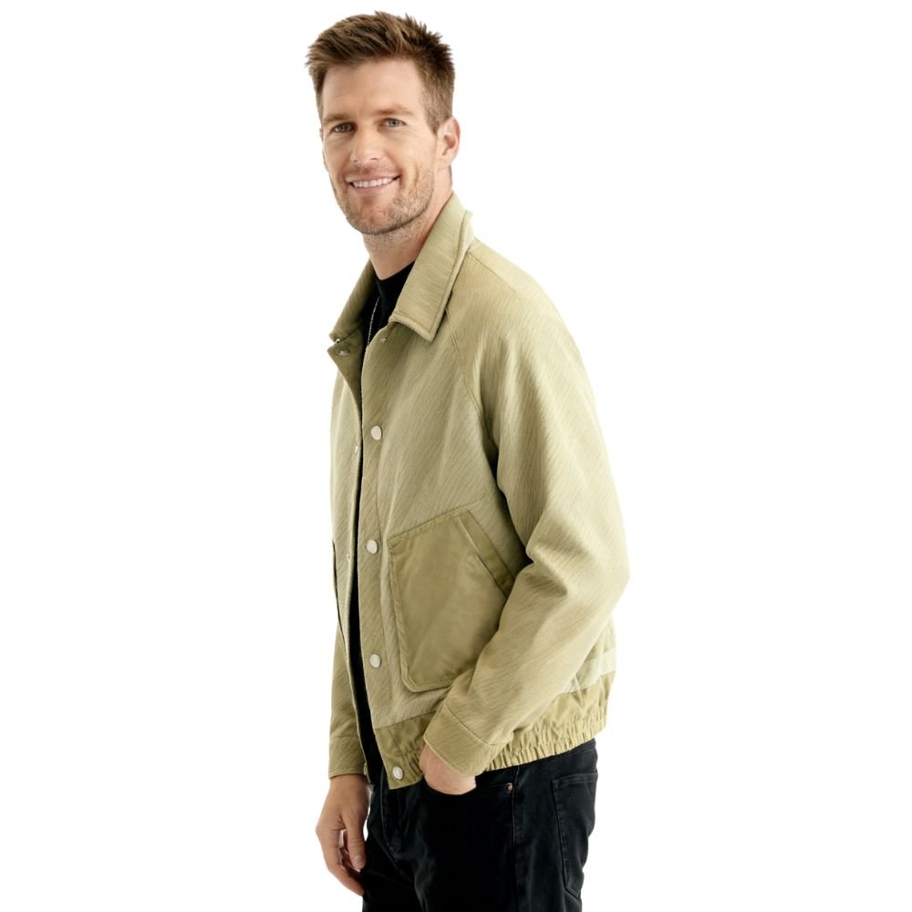 Model wearing the Kouvr Fashion Aiken corduroy shacket in khaki 