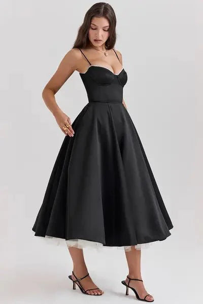 cinched waist," "voluminous skirt," "fit and flare silhouette," "sophisticated," "formal attire," and "special occasion