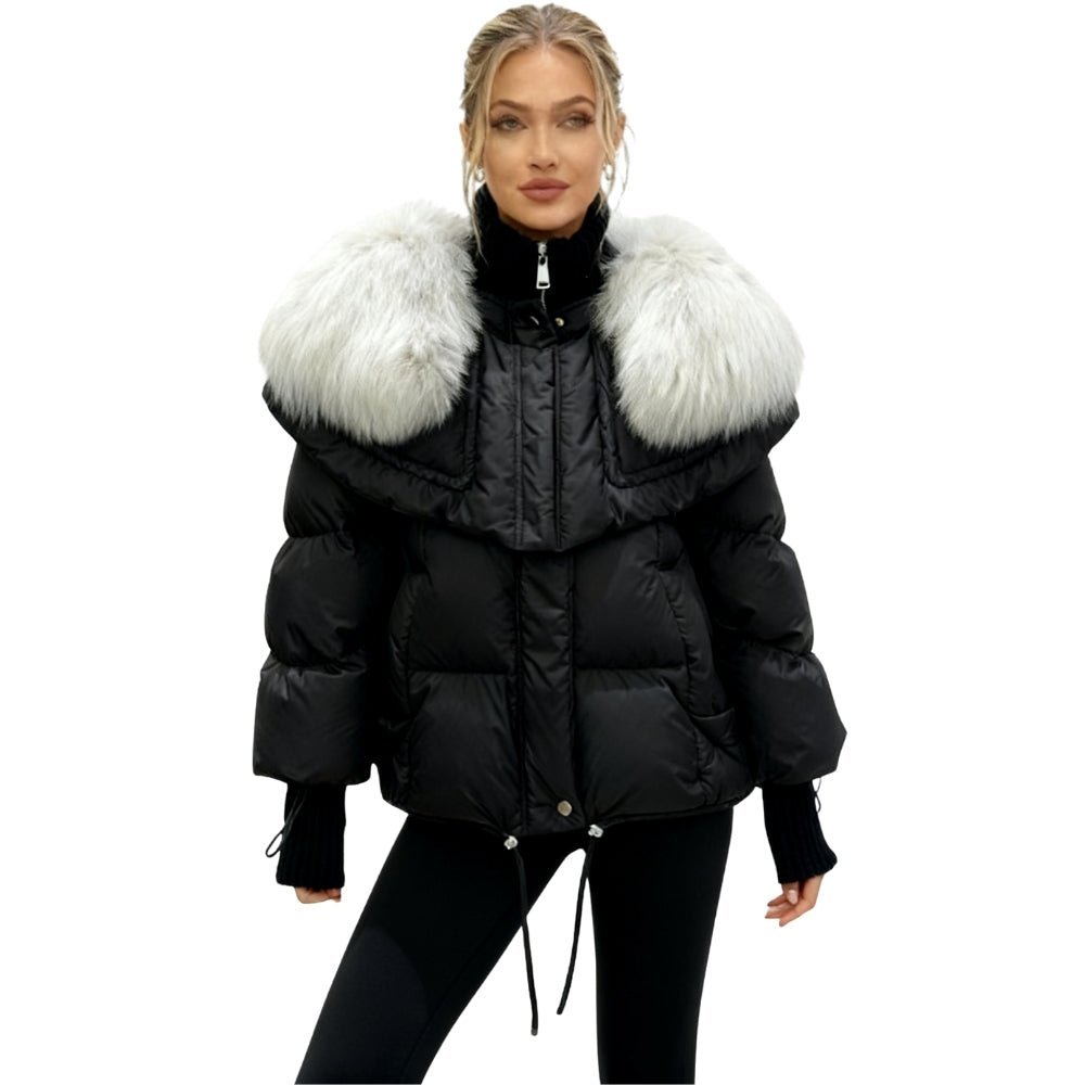 Black Kouvr puffer jacket with white fur collar worn by a model on a white background
