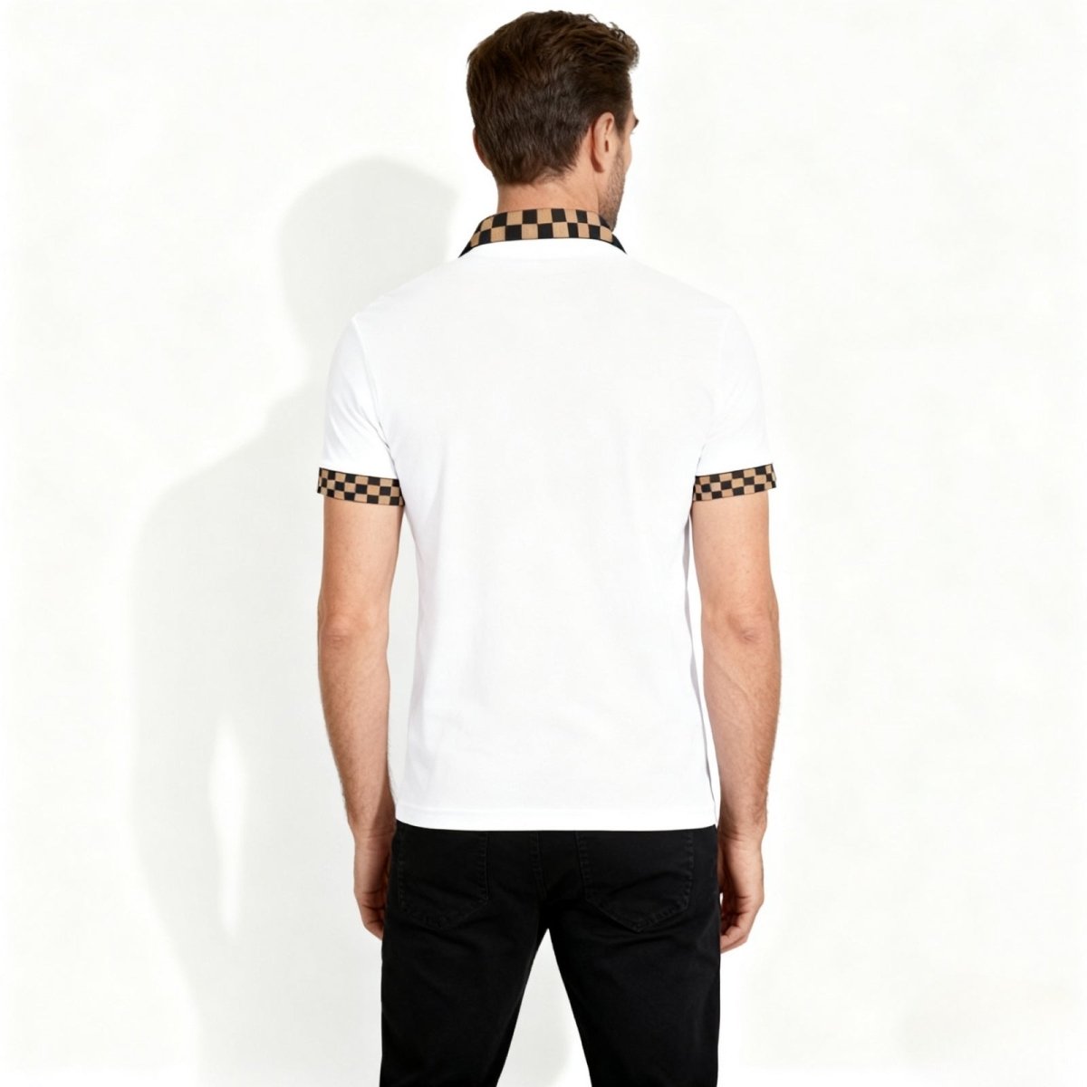 Back view of a male model wearing the Kouvr Fashion white polo, highlighting the checkered collar design from behind.