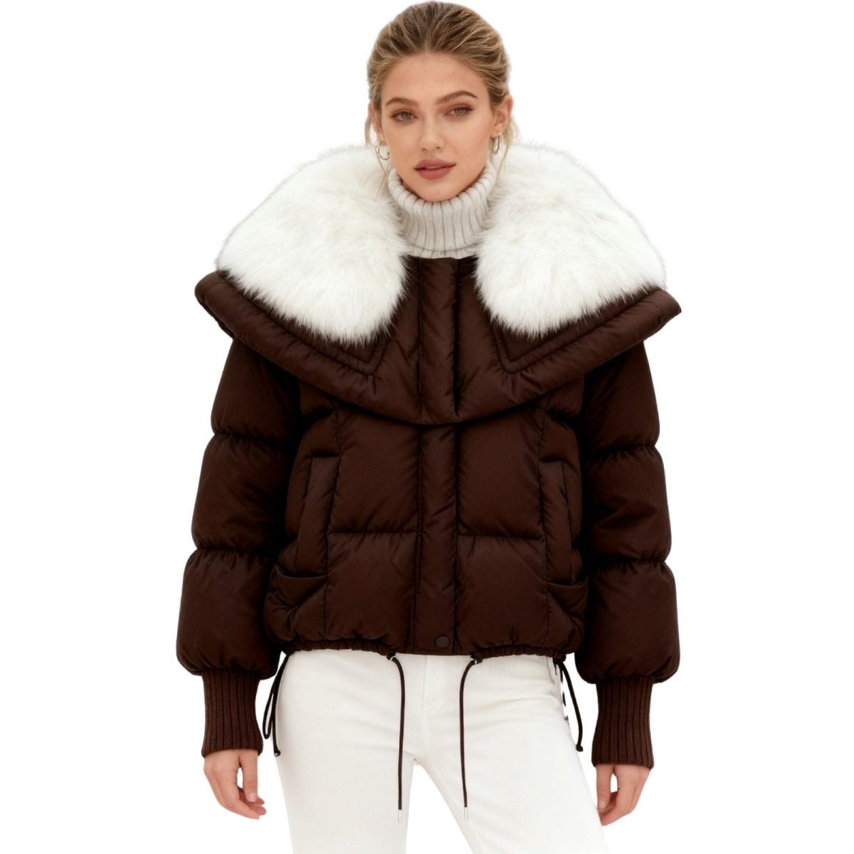 Woman wearing a brown Kouvr puffer jacket with white fur trim on a white background