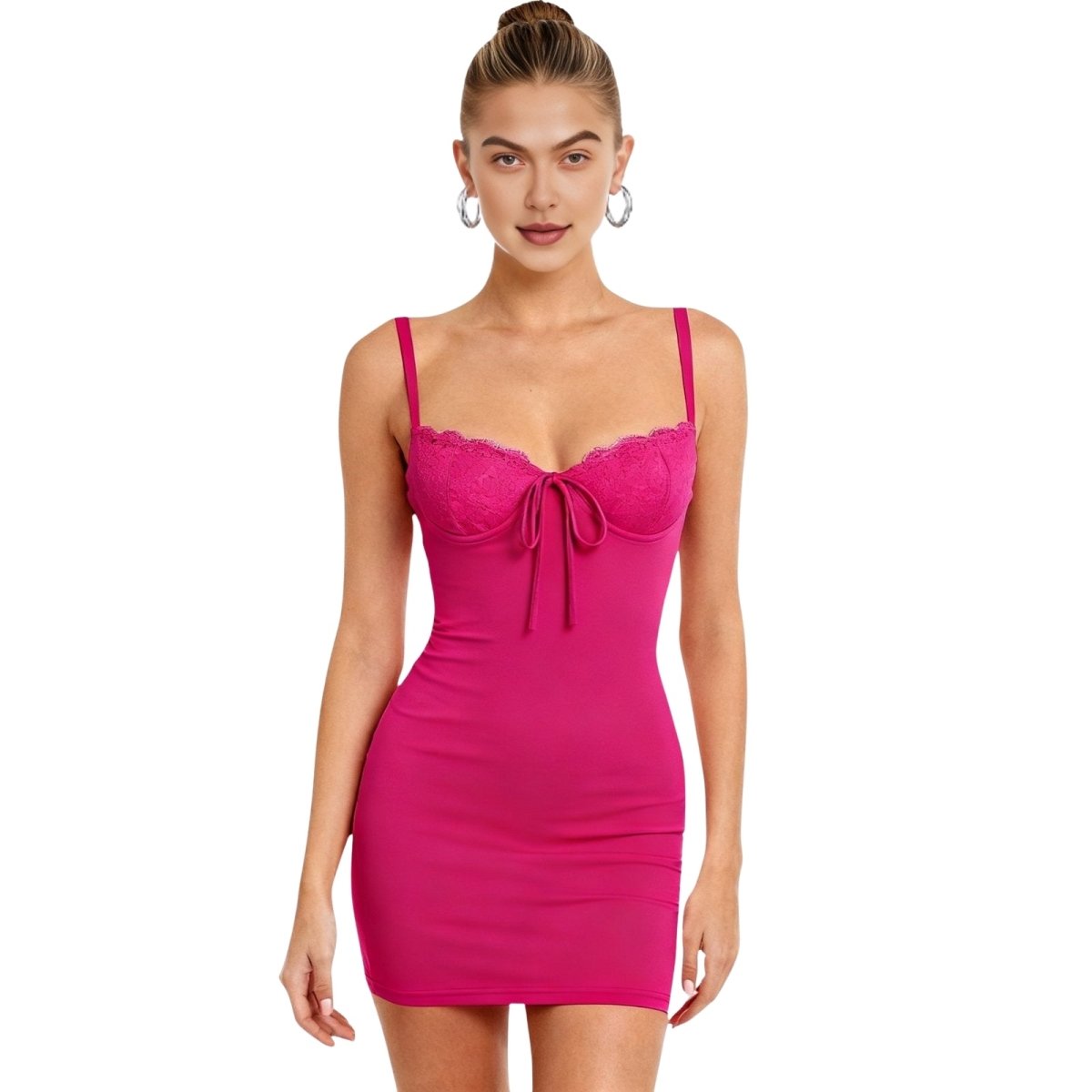 Woman wearing a rose red kouvr dress with thin straps on a white background