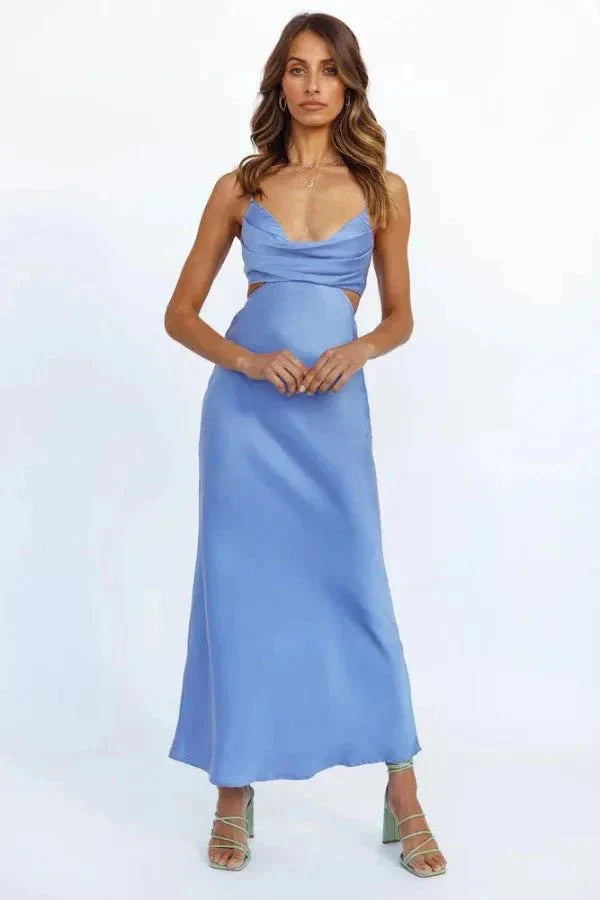Model wearing the Kouvr Fashion Clamille open-back satin maxi dress in cornflower blue