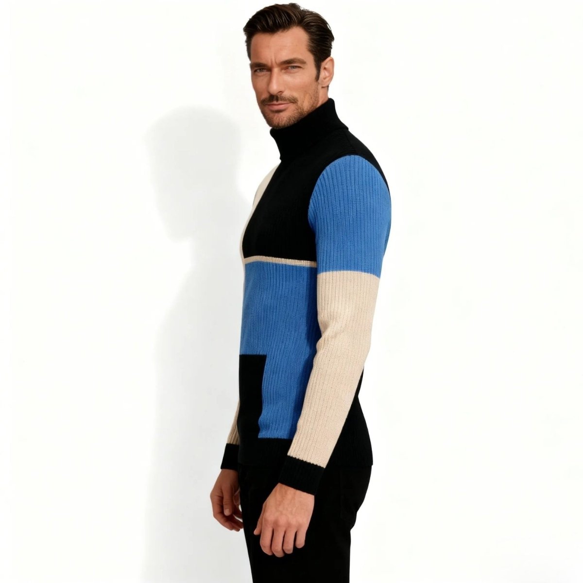 Male model in a side profile view showcasing the slim fit of the Kouvr Fashion geometric ribbed knit turtleneck.
 