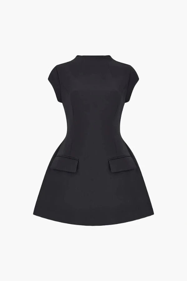 Studio product shot of the black Ella A-line mini dress with a mock neck and structured pockets on a white background.