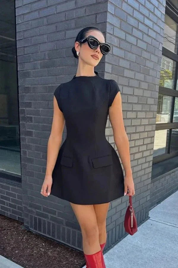 Sculptural, architectural, fit and flare, cinched waist, ella Hepburn style, 60s mod dress, boat neck, cap sleeve, cocktail attire.